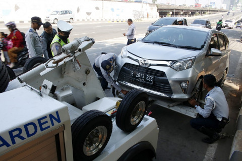 Parkir Mobil Ganjil Genap Mulai Berlaku