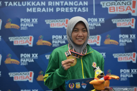 Pemilik Medali Emas Terbanyak PON Papua Bertanding dengan Tangan Tertanam Pen