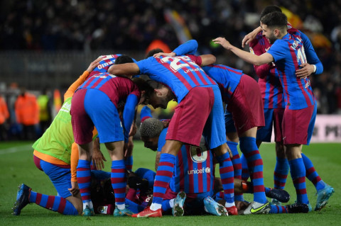 Foto Terpopuler: Barcelona Tundukkan Sevilla hingga BTS Tampil Lengkap di Grammy Awards