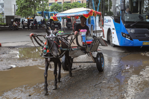 Jalan Rusak Akibat Hujan Ekstrem