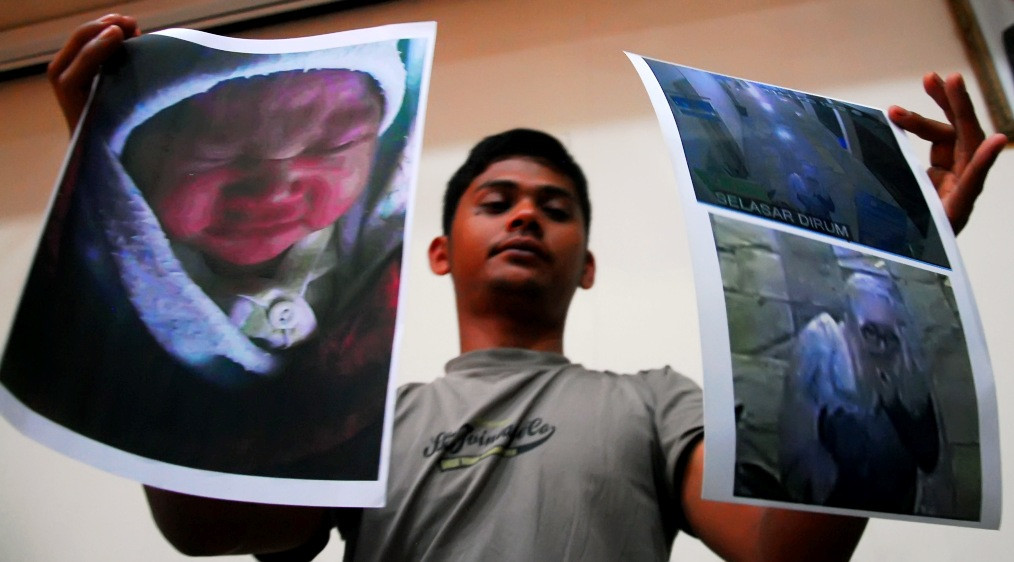 Foto rekaman CCTV saat pelaku menculik bayi. (foto: Antara)