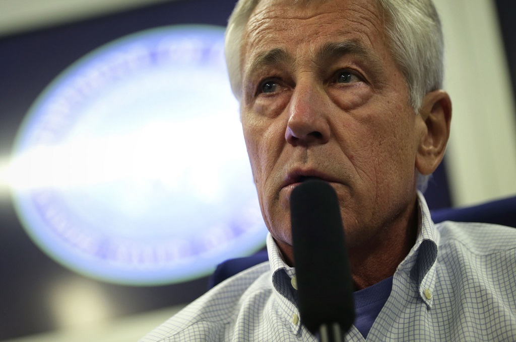 Chuck Hagel dalam serangkaian tur Asia meliputi Jepang, Tiongkok dan Mongolia -- ALEX WONG / POOL / AFP