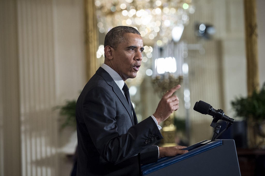Presiden AS Barack Obama berbicara di ruang bagian timur Gedung Putih -- BRENDAN SMIALOWSKI / AFP