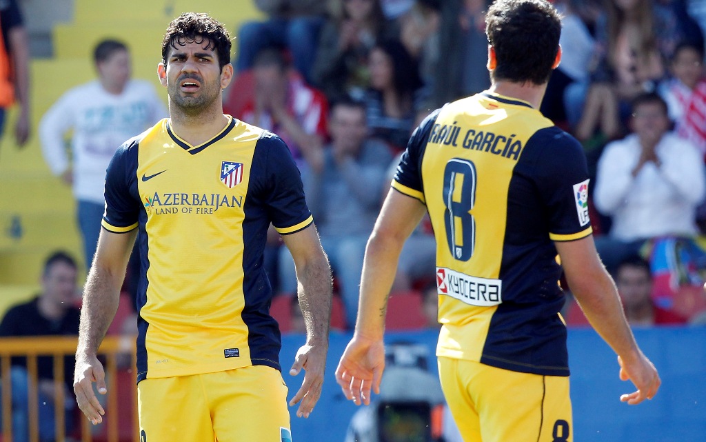 Diego Costa (kiri).(foto:AP/Aleberto Saiz)