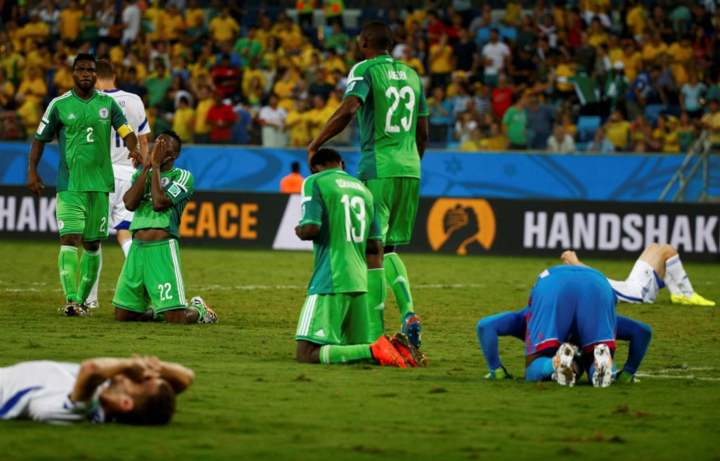 Pemain Nigeria merayakan kemenangan (REUTERS/Michael Dalder )