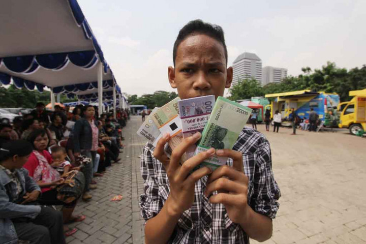 Penukaran Uang di Monas Dipenuhi Warga Sejak Pagi