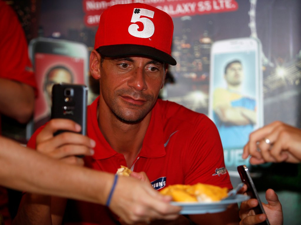 Rio Ferdinand saat di Singapura 15 Juli 2014.(foto:Reuters/Edgar Su)