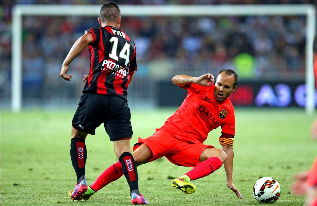 Andres Iniesta (kanan).(foto:Reuters/Eric Gaillard)
