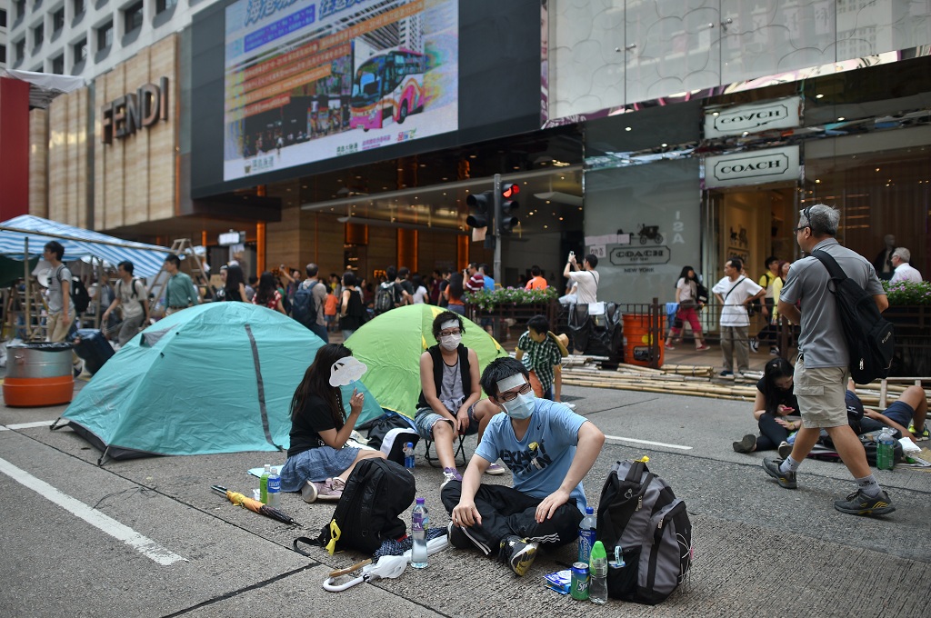 Pendemo pro demokrasi memadati jalanan Hong Kong di hari kedelapan unjuk rasa yang digelar sejak Sabtu (27/9/2014) - AFP/PHILIPPE LOPEZ