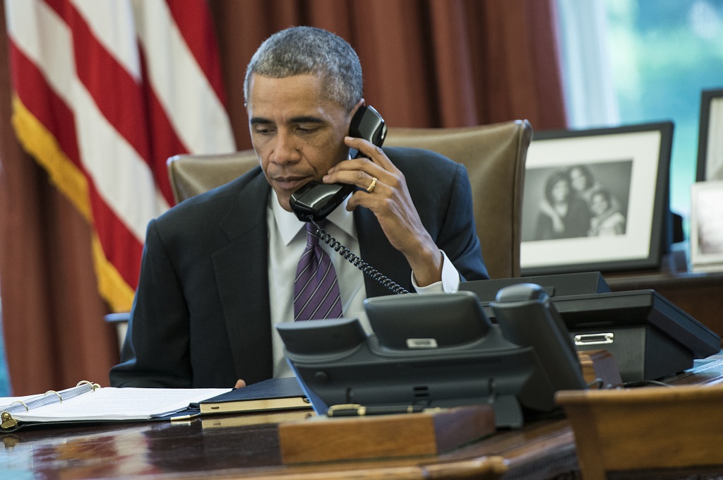 Presiden AS Barack Obama menghubungi sejumlah pejabat lokal terkait kesigapan mencegah mewabahnya virus Ebola di AS - AFP/BRENDAN SMIALOWSKI