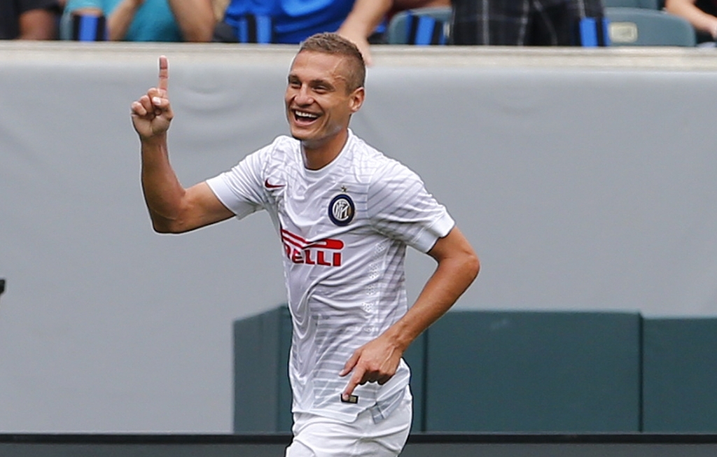 Selebrasi gol Nemanja Vidic (Foto: AP Photo/Rich Schultz)