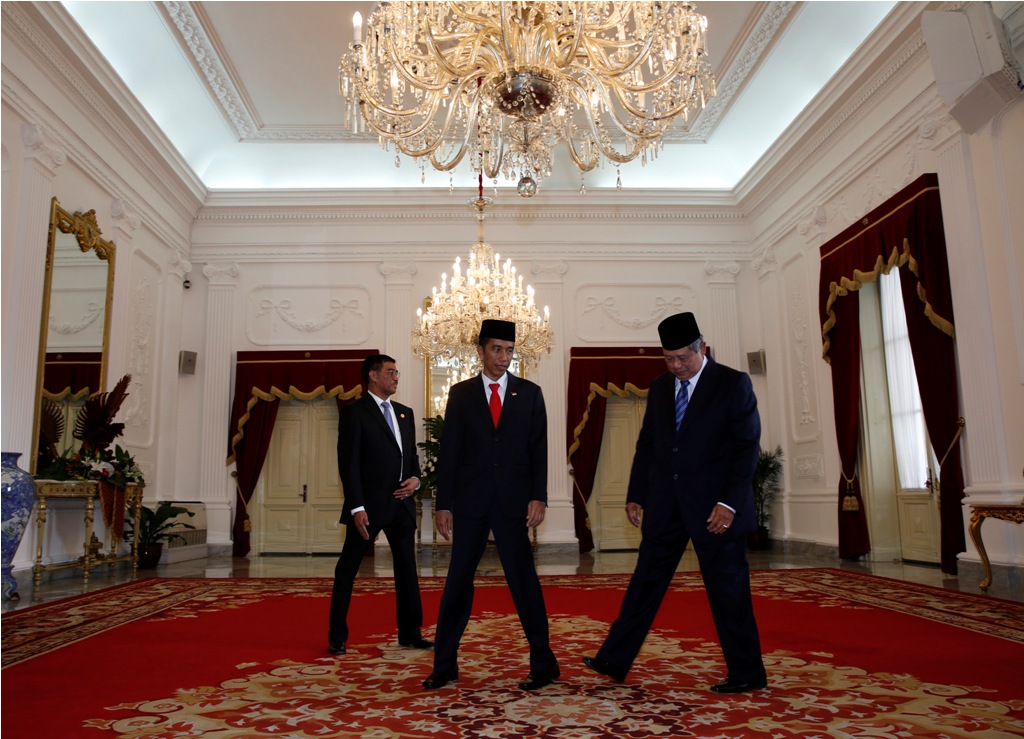 Presiden Joko Widodo dan SBY (Foto: AFP)