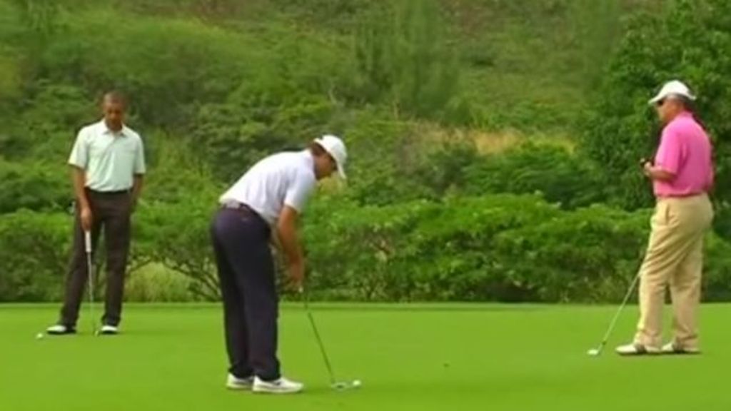 PM Najib Razak dan Obama yang bermain golf (Foto: Reuters)