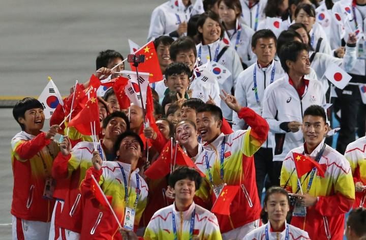 Kaleidoskop Olahraga 2014: Superioritas Tiongkok, Schumacher, dan Skandal Doping Chong Wei  