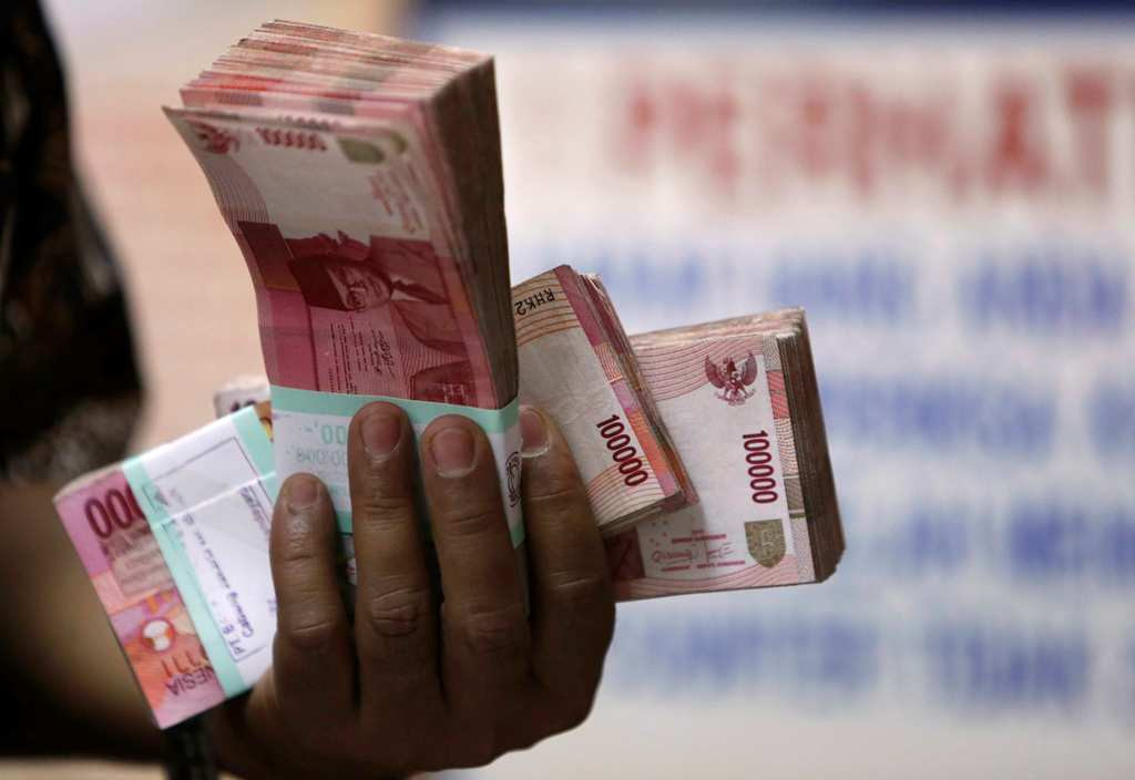 Ilustrasi mata uang rupiah -- FOTO: REUTERS/Beawiharta