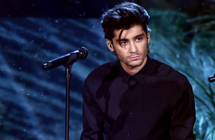 Ini Alasan Zayn Malik Absen di Tur Konser One Direction 