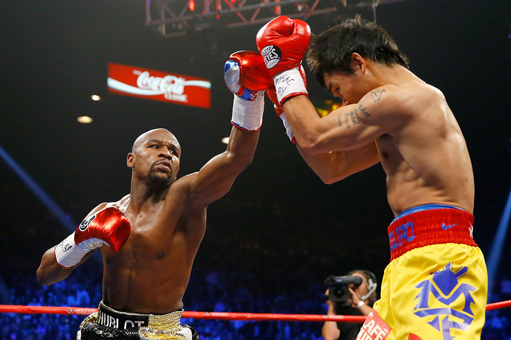 Mayweather Pertahankan Sabuk Juara dari Pacquiao