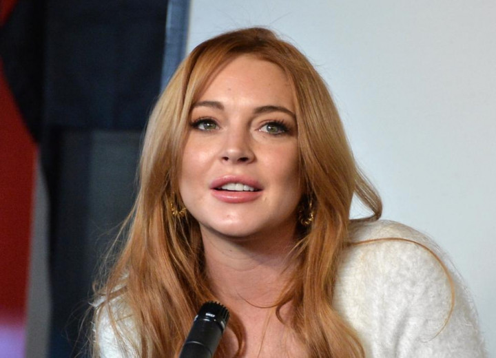 Membawa Al Quran, Lindsay Lohan Akhirnya Masuk Islam? 