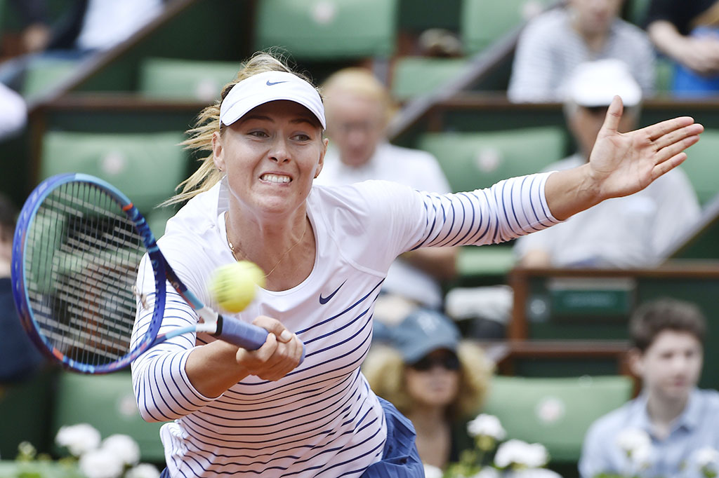 Sharapova Melaju Mulus ke Babak Ketiga