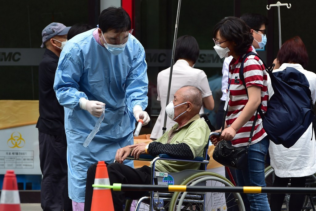 Virus MERS mewabah di Korsel. (Foto:AFP/Jung Yeon-Je)
