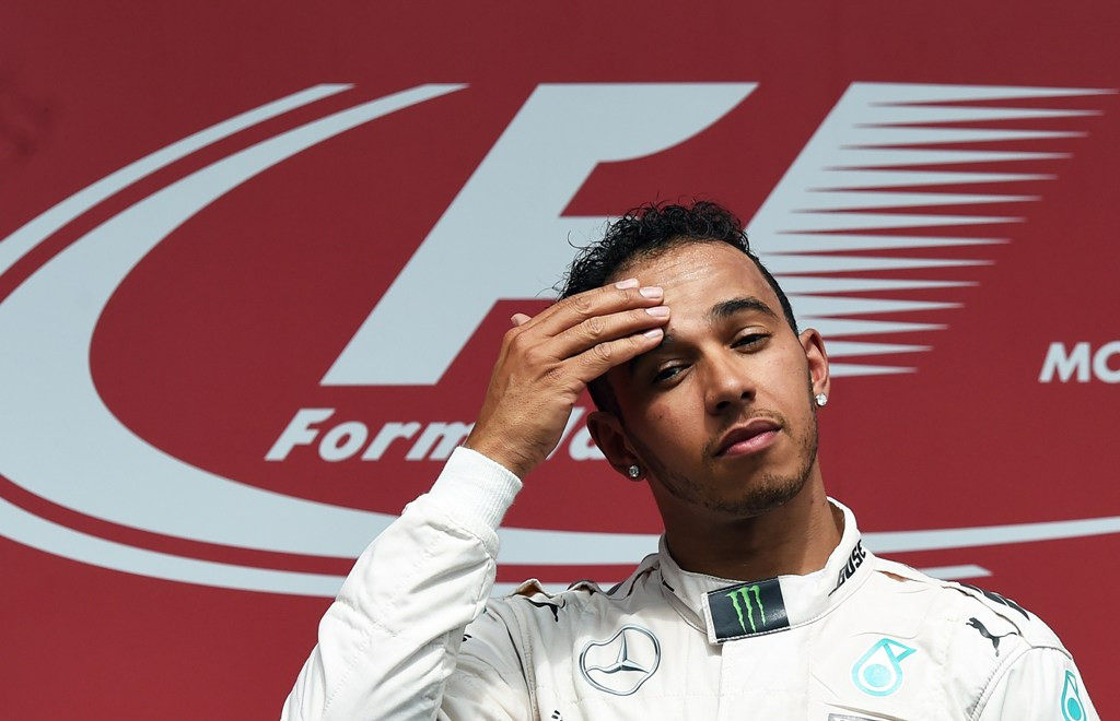 Pembalap Mercedes Lewis Hamilton (AFP PHOTO/JEWEL SAMAD)