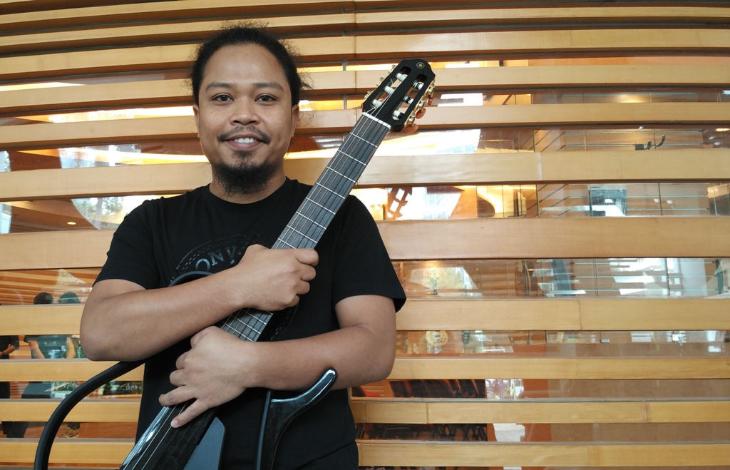 Vokalis Payung Teduh, Is (Foto:Metrotvnews.com/Agustinus Shindu A)