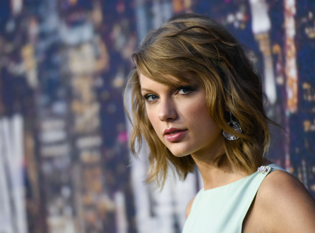 Taylor Swift akhirnya setuju untuk memasukkan album terbarunya di Apple Music. Evan Agostini/InvisionAP