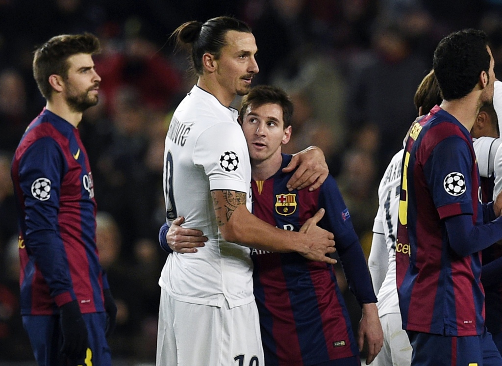 Ibrahimovic saat memperkuat Paris Saint-Germain melawan Barcelona yang diperkuat Lionel Messi pada Liga Champions 2014--2015 (LLUIS GENE / AFP)