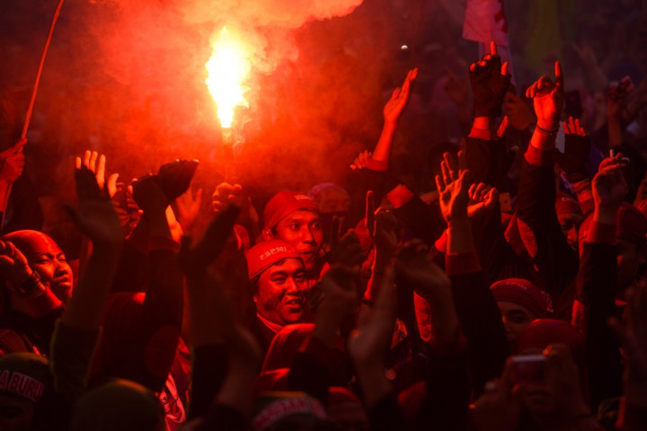 Tanpa Standar Hidup, Buruh akan Memilih Bekerja di Singapura 