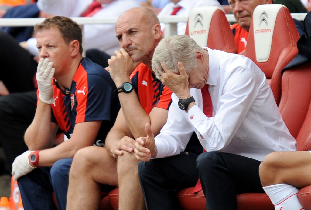 Ekspresi Arsene Wenger setelah melihat Arsenal dipermalukan West Ham. (Foto: AP/Andrew Matthews)