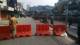 Penggusuran Dilanjutkan, Pengamanan Kampung Pulo Diperketat 