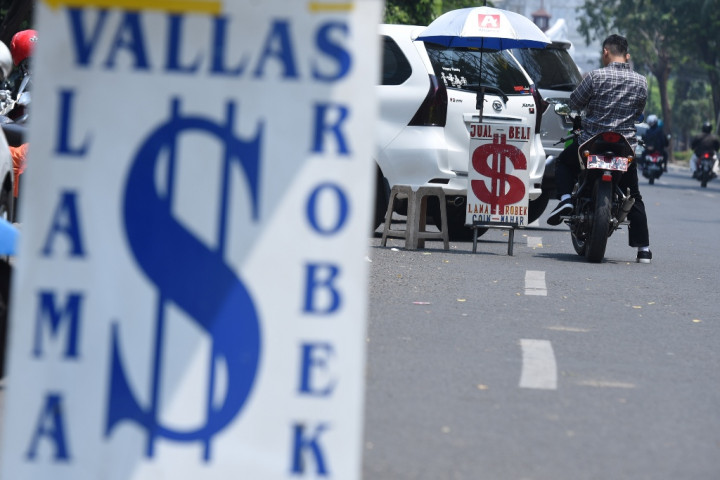 Bertransaksi Valas Layaknya Penembak Jitu