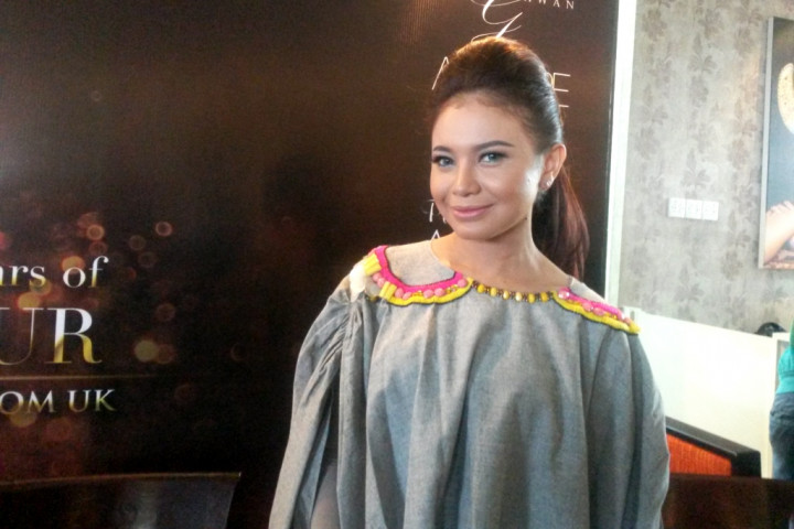 Rossa Tak Mau Lagi Pakai Baju Terbuka 