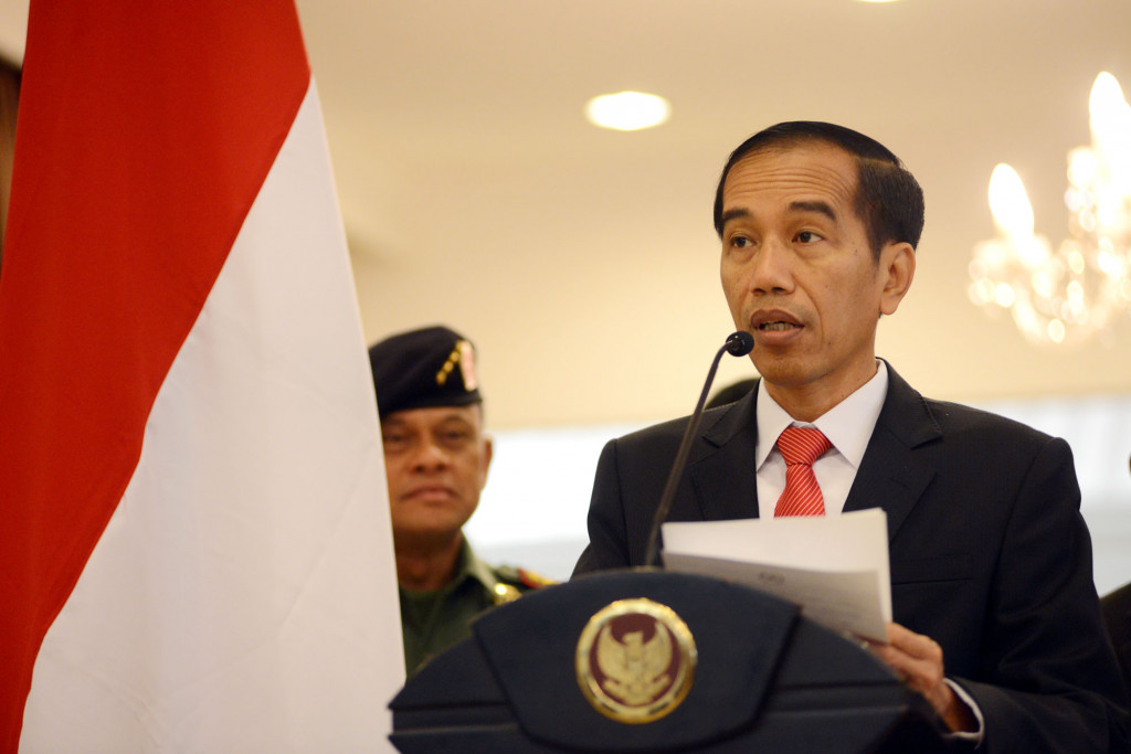 Presiden Joko Widodo sebelum bertolak menuju Timur Tengah di Bandara Halim Perdanakusuma, Jakarta, Jumat 11 September 2015. Foto: MI/Panca Syurkani