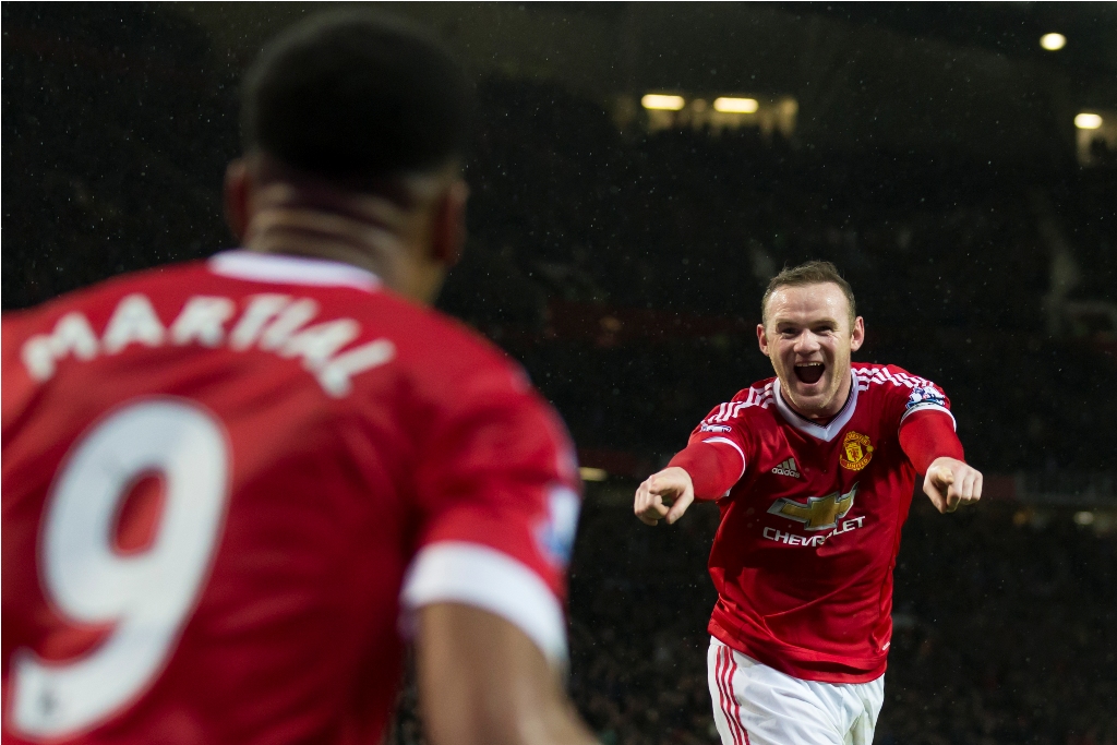 Wayne Rooney mencatatkan rekor di Liga Primer (Foto: AP Photo/Jon Super)