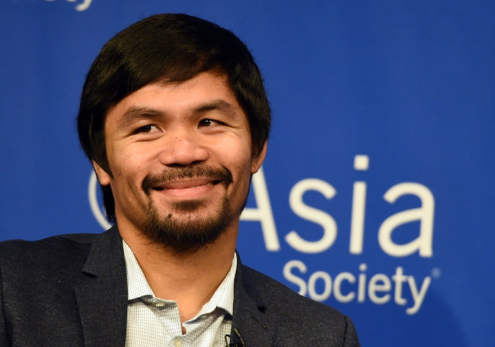 Pacquiao 'Gantung Sarung' Usai Lawan Bradley