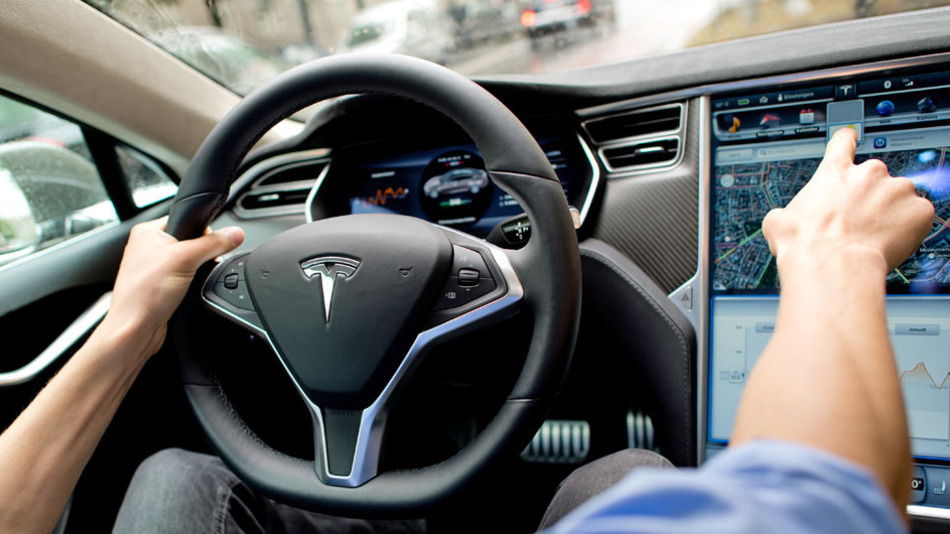 Tesla berikan fitur baru bersamaan dengan peluncuran update software. (SVEN HOPPE, PICTURE-ALLIANCE, DPA ASSOCIATED PRESS)