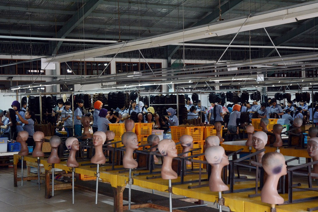 illustrasi Tenaga Kerja. Foto LILIEK DHARMAWAN. 