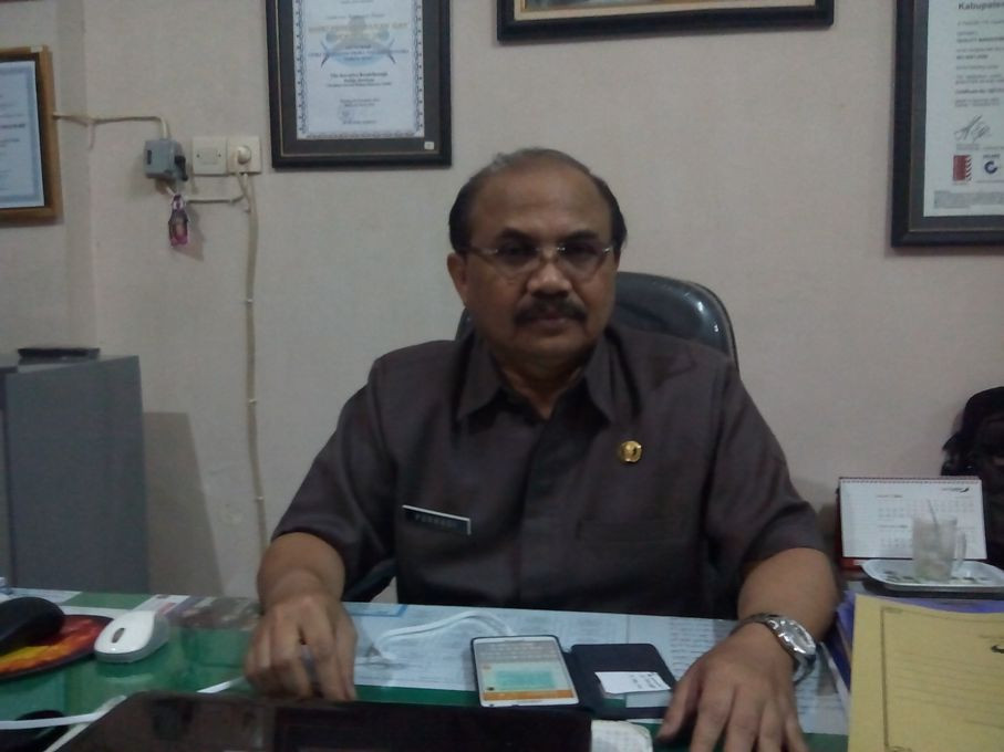 Kepala Dinas Kependudukan dan Pencatatan Sipil Kabupaten Malang, Purnadi di kantornya. Selasa (23/2/2016). Foto: MTVN/ Aditya Mahatva Yodha.