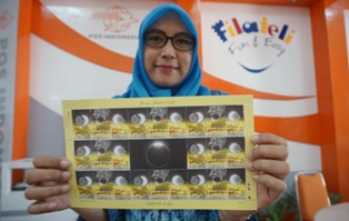 Ada Prangko Bertema Gerhana Matahari Total