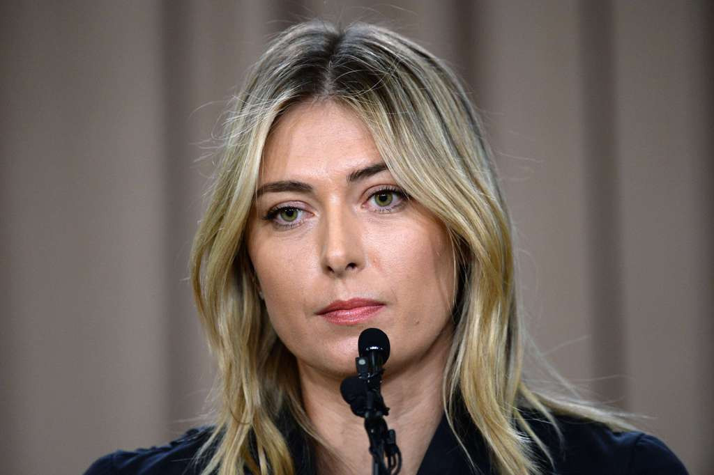 Ekspresi Maria Sharapova dalam jumpa pers penggunaan doping di Los Angeles, California. (Kevork Djansezian/Getty Images/AFP)
