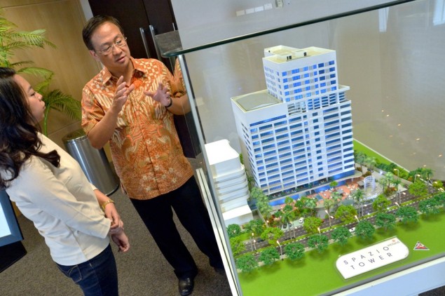 Intiland Development Turun Peringkat