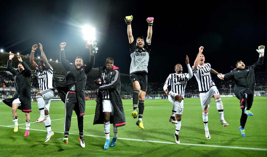 Skuat Juventus merayakan kemenangan. (Foto: AFP/Alberto Pizzoli) 