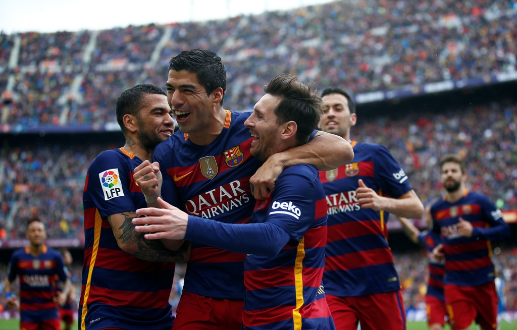 Para pemain Barcelona merayakan pesta gol ke gawang Espanyol (Foto: AP)