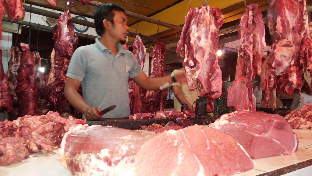 Ilustrasi pedagang daging sapi (Foto: MI?Benny Bastinady)