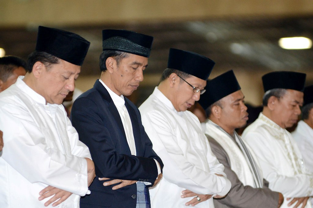 Presiden Joko Widodo (peci hitam). (MI/Panca Syurkani)