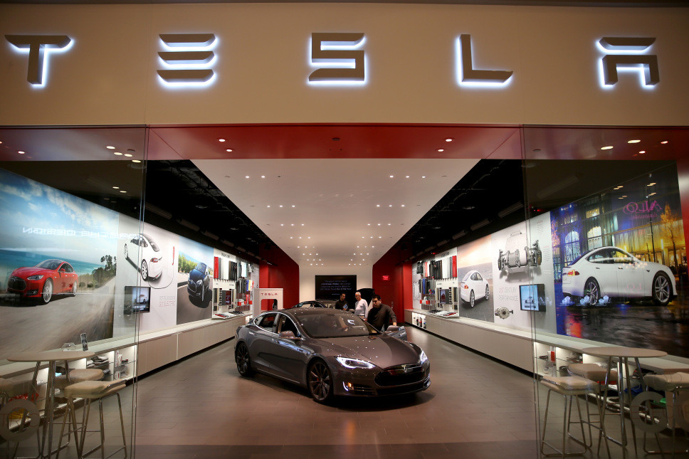 Tesla mengakuisisi SolarCity. (Getty Images)
