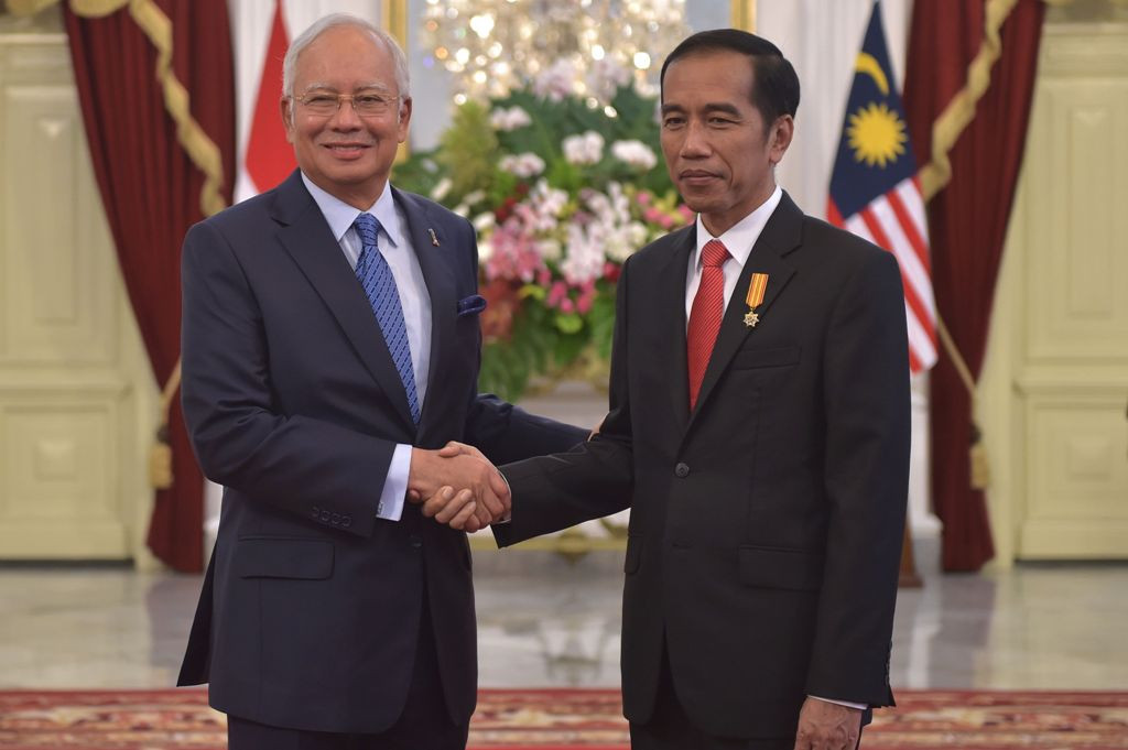 PM Malaysia Najib Razak saat diterima Presiden Joko Widodo (Foto: AFP)
