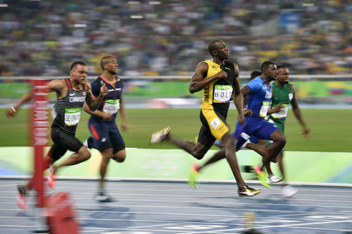 Usain Bolt Pertahankan Gelar Manusia Tercepat Dunia