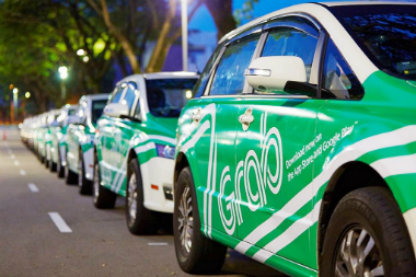 Saat Gojek Ribut, Grab Bagikan 600 Batik ke Pengemudi